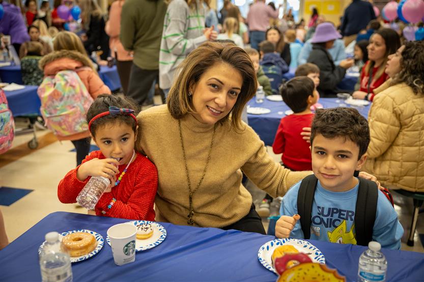Students enjoy pastries with their parents